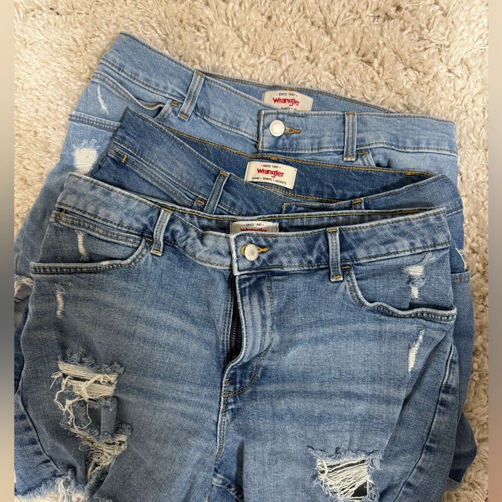 Three Wrangler denim shorts